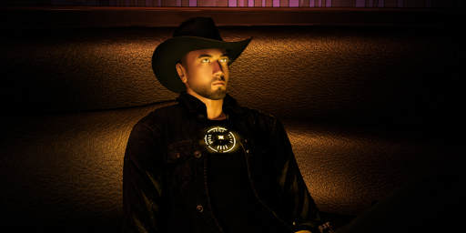 Lex Mars sits in dramatic shadow wearing a black cowboy hat and dark clothing, with warm amber light illuminating his face and a glowing circular device embedded in his chest.